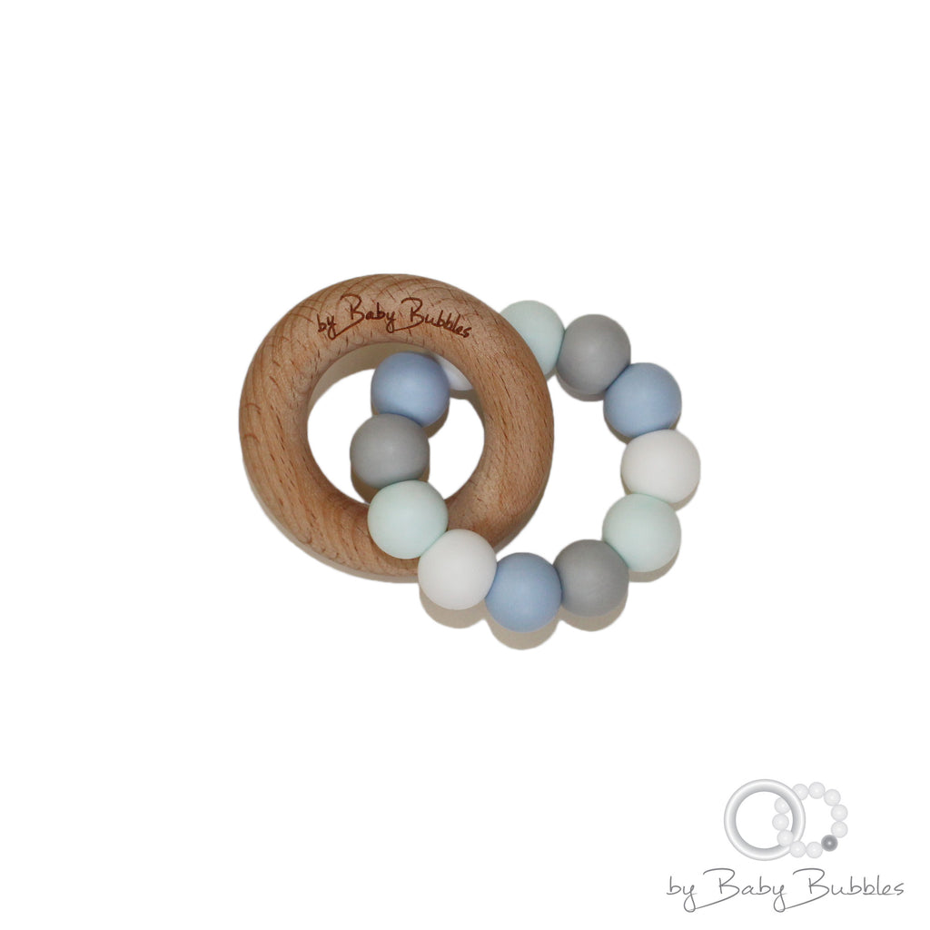 Pastel blue and green teething ring for baby